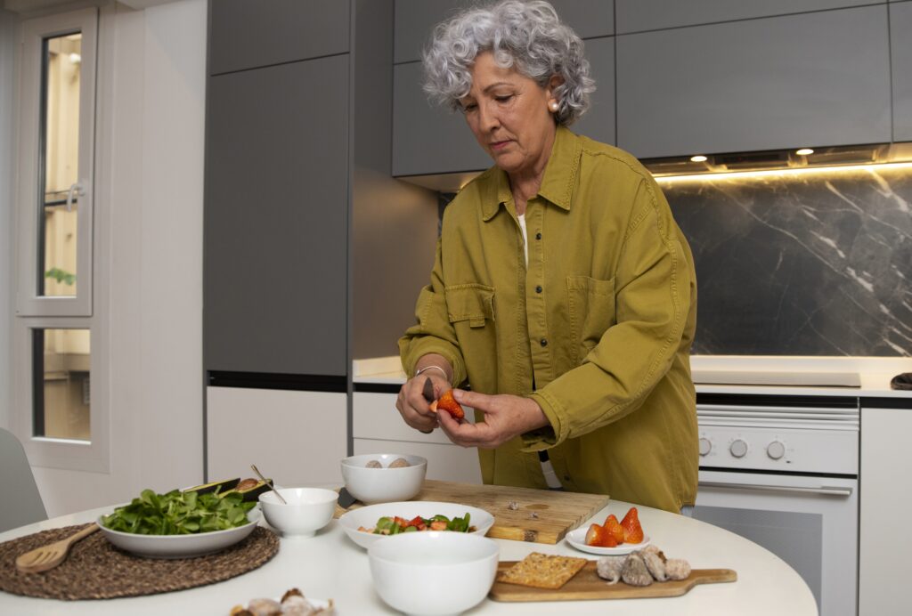 About 2 Portrait of Chef Margaret “Maggie” Rowe smiling in a cozy kitchen, surrounded by Southern-style ingredients and handwritten recipe cards.